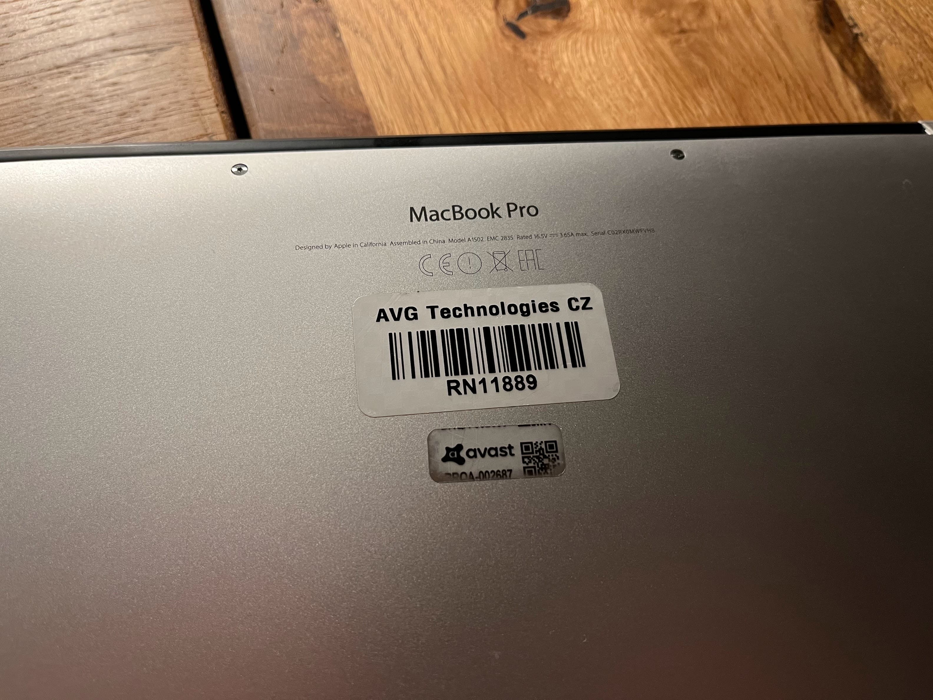 Macbook 2013 back side with inventory stickers